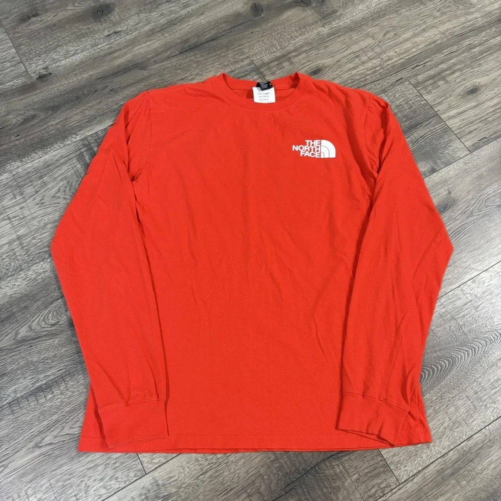 The North Face Shirt Mens Medium Orange Long Sleeve Graphic Circular Design